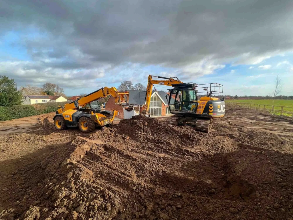 Plant machinery hire near me West Yorkshire including tools and equipment with excavators and dumpers on site