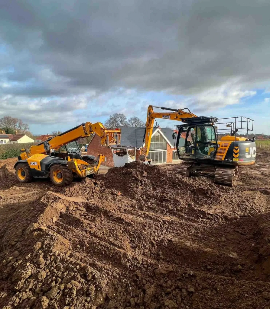 Plant machinery hire near me West Yorkshire including tools and equipment with excavators and dumpers on site